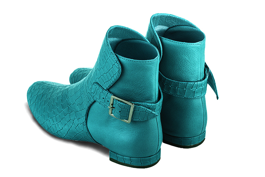 Turquoise blue women's ankle boots with buckles at the back. Round toe. Flat block heels. Rear view - Florence KOOIJMAN